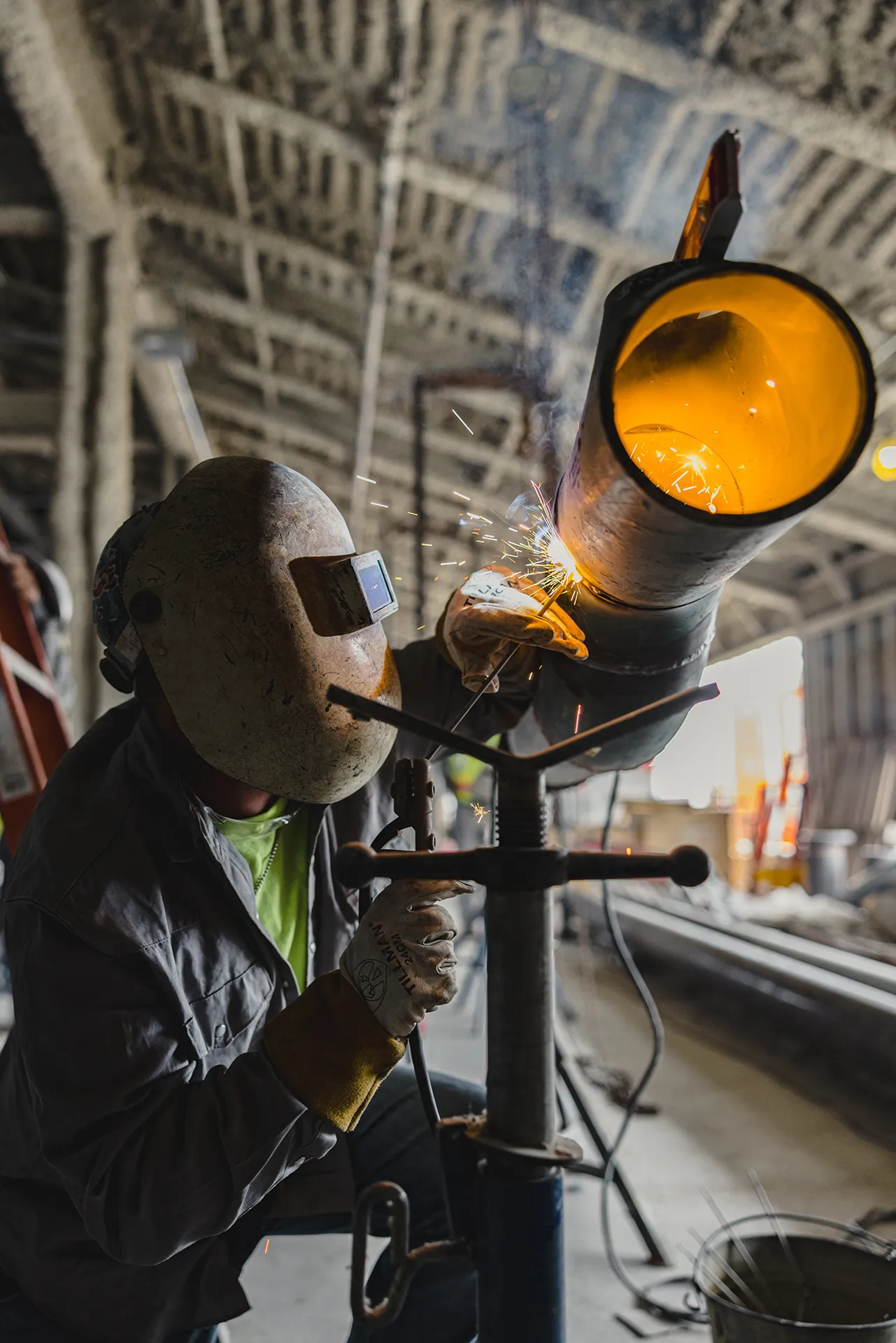 Welder working on a Rabren construction project